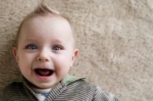 Baby lying on Carpet