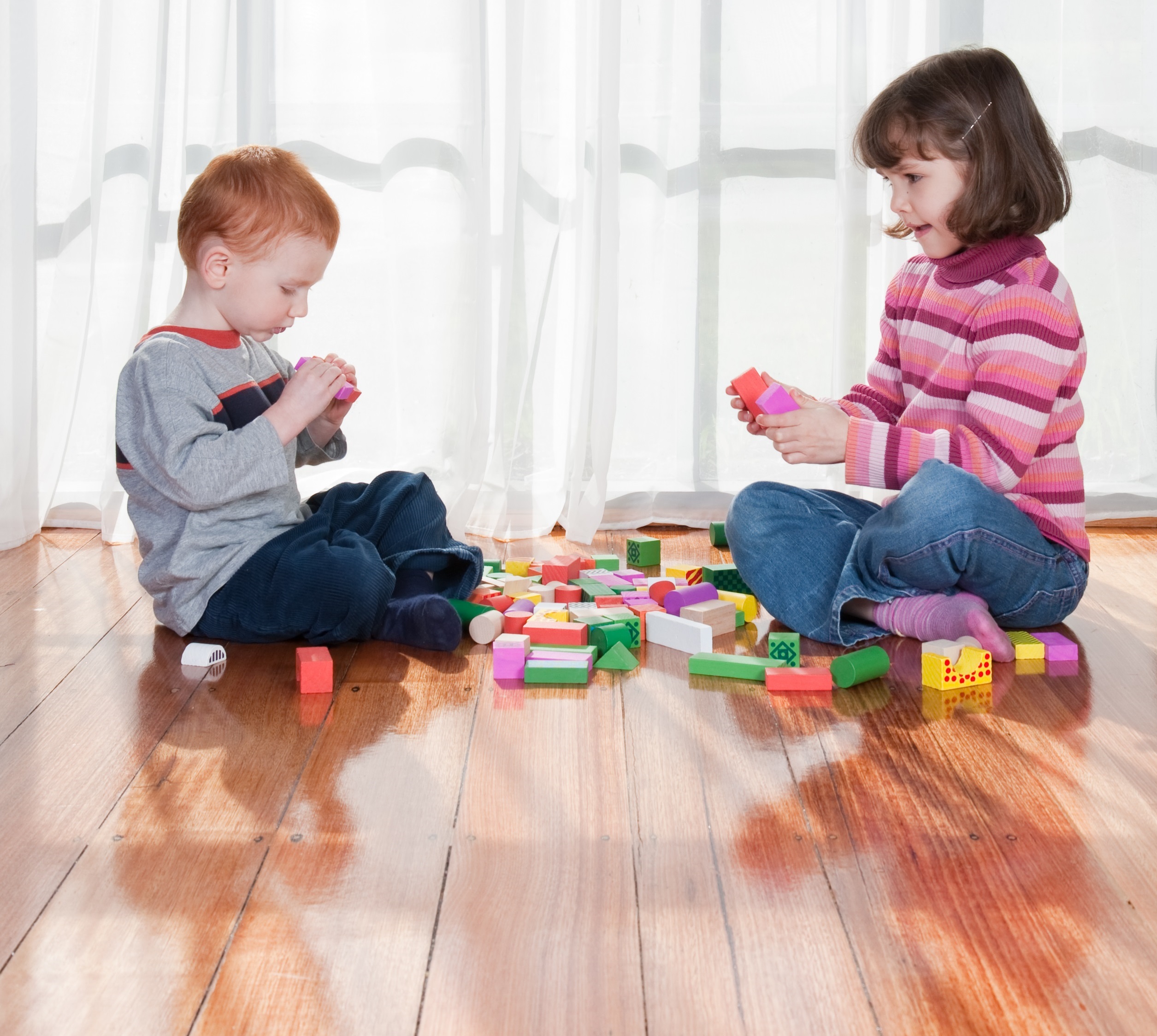 Playing puzzles. Child playing on the Floor. Child playing in Living Room. Clean Floor and child Play.