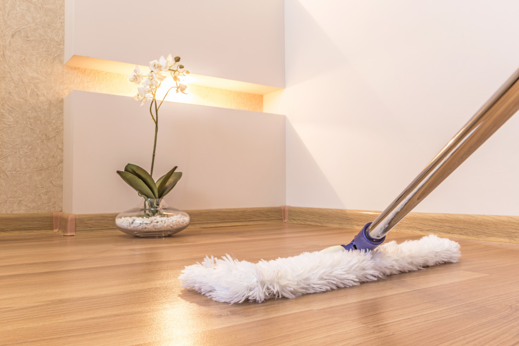 sweeping wood floors